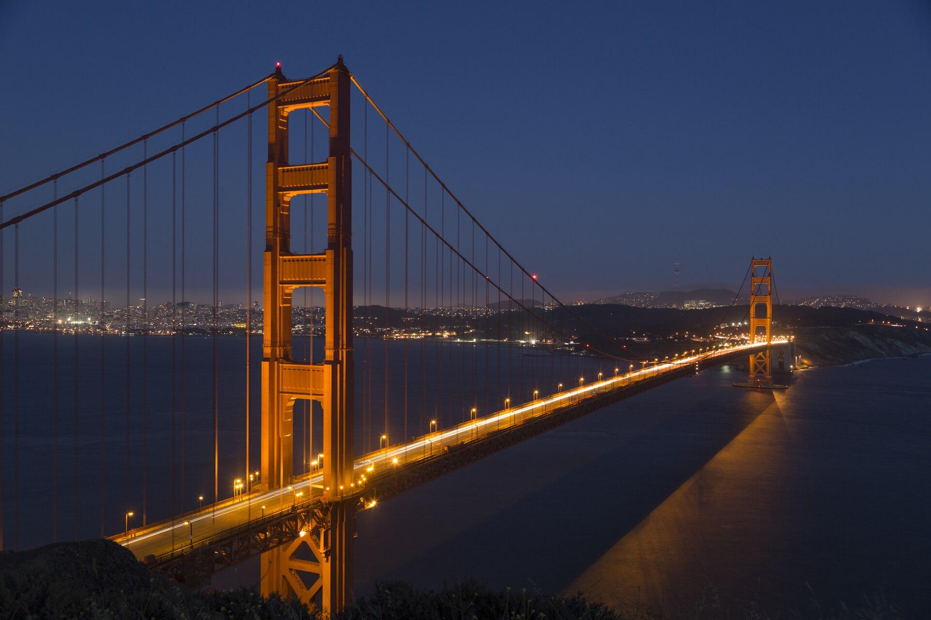 The Golden Gate Bridge and San Francisco skyline at dusk