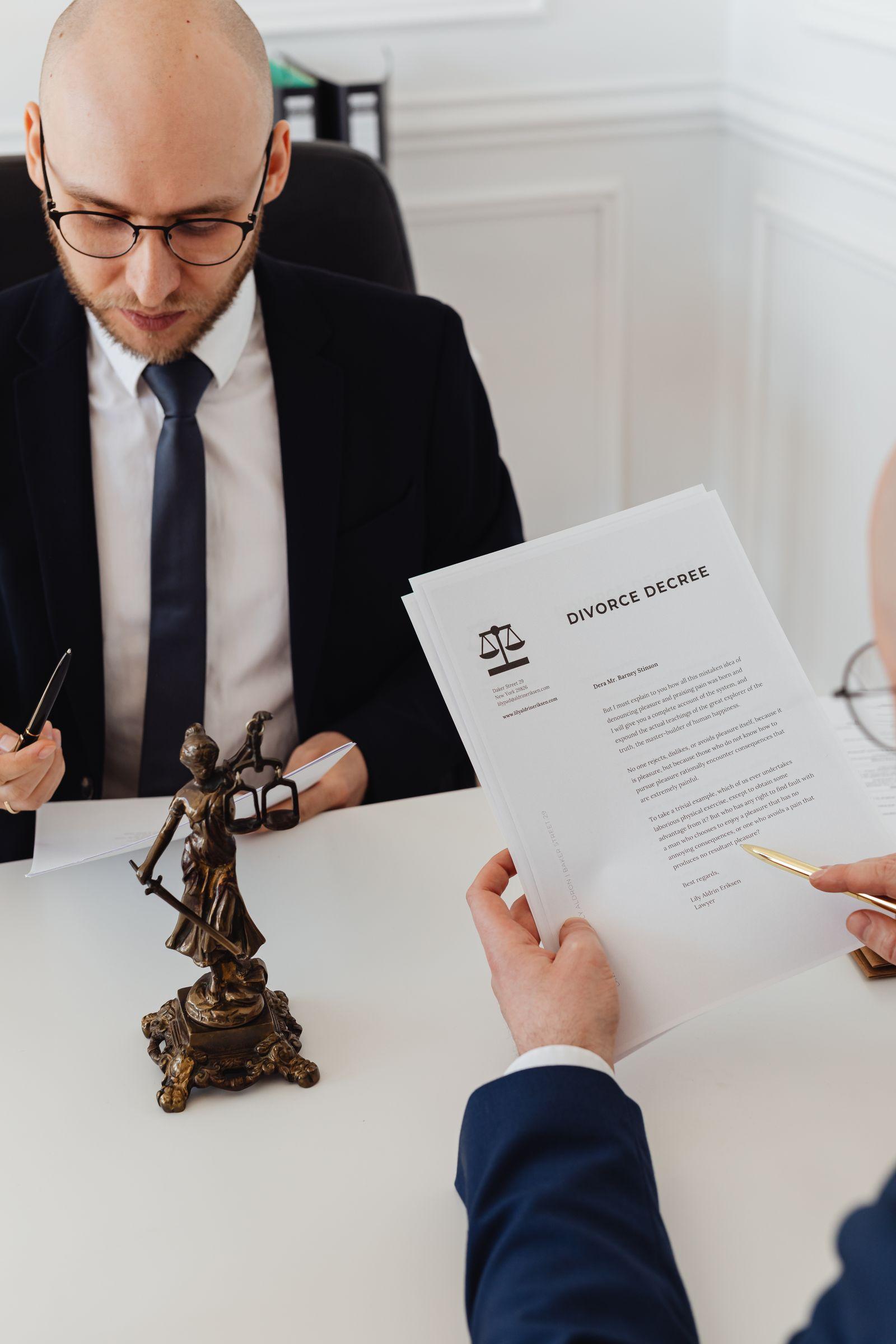 Two legal professionals reviewing translated case documents in a law office