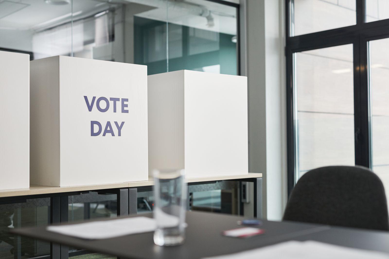 Civic office with voting booths set up for local residents
